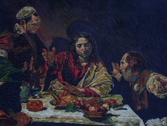 Painting of men gathered around a table with bread and fruit, their faces and clothing emerging from deep shadow.