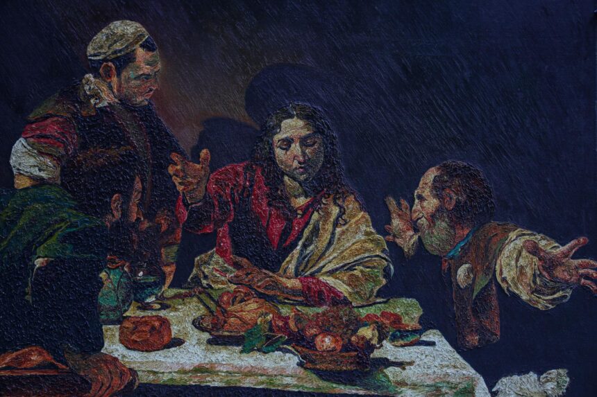 Painting of men gathered around a table with bread and fruit, their faces and clothing emerging from deep shadow.